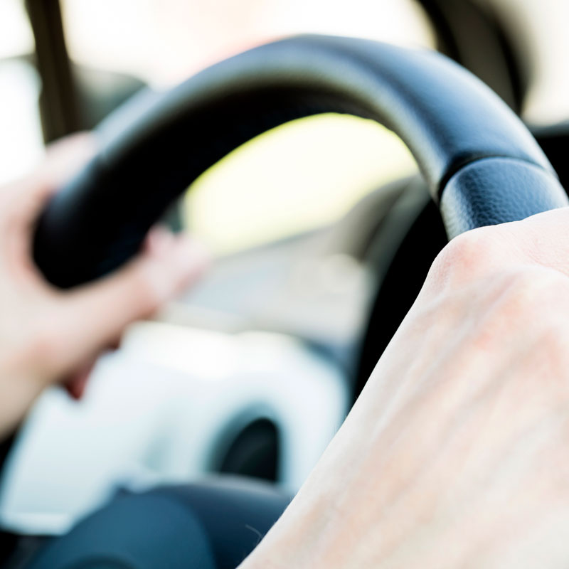 hands on steering wheel